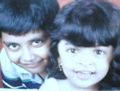 Dhanie and her brother yohan when she was four